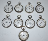 Nine hallmarked and other silver open faced pocket watches each with Roman numerals, engraved case