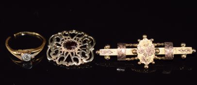 A 9ct gold Victorian brooch, Birmingham 1892, 9ct gold brooch set with a garnet (4.5g) and an 18ct