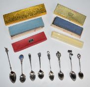Eight various hallmarked silver and white metal souvenir spoons, some being 800 grade, weight 88g