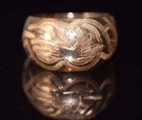 A 14ct rose gold ring with engraved decoration, 5.9g, size O