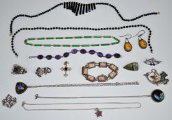A collection of silver jewellery including Arts & Crafts pendant set with opals, amethyst