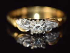An 18ct gold ring set with a diamonds in a platinum setting, 2.8g, size L