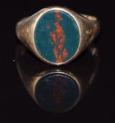 A 9ct gold signet ring set with bloodstone, 5.9g, size R