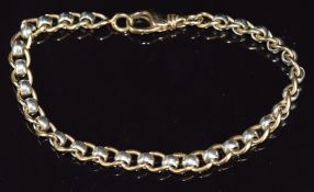 A 9ct gold bi-coloured bracelet made up of oval and circular links, 16.5g, 20cm long
