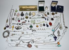 A collection of silver and costume jewellery including bracelets, necklaces, earrings, etc