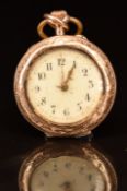Unnamed 14ct gold keyless winding open faced pocket watch with gold hands, Arabic numerals, cream