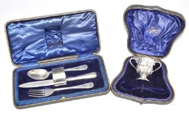 Cased hallmarked silver spoon, knife, fork and napkin ring together with a cased hallmarked silver
