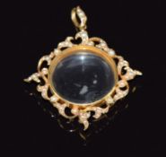 Edwardian 15ct gold locket set with a border of seed pearls, 11.4g, 4 x 3cm