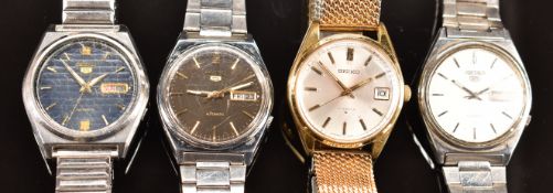 Four Seiko gentleman's wristwatches comprising three Seiko 5 automatic all on stainless steel