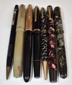 Seven pens and pencils comprising two Onoto with 14ct gold nibs, Parker with rolled gold cap, Conway