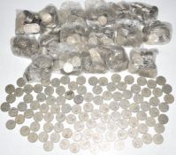 Approximately 10.64kg of UK post 1947 two shilling pieces