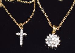 An 18ct gold pendant set with diamonds (1.7g), and a 9ct gold cross pendant, both on 9ct gold
