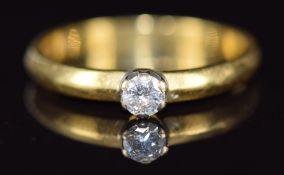 An 18ct gold ring set with a diamond of approximately 0.15ct, 2.5g, size L