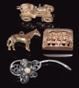 Three 9ct gold charms, a horse, car and moving dancers together with a section of Victorian brooch