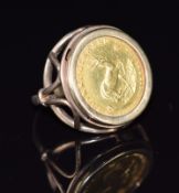 A 9ct gold ring set with a 1981 1/10 gold krugerrand, 6.1g, size I
