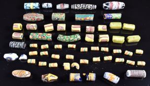 A collection of 19thC and earlier Venetian/ Egyptian glass beads including millefiori