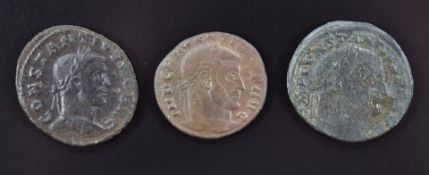 Three Roman Imperial bronze coins comprising Follis coins of Maxentius 308-310AD and Constantius I