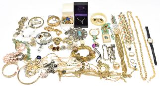 A collection of jewellery including Grosse earrings, mother of pearl button, filigree brooch,