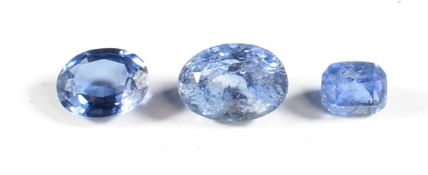 A loose oval cut cornflower blue sapphire (0.8g), a cushion cut cornflower blue sapphire (0.27g),