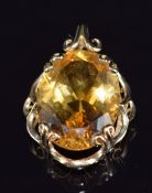 A 9ct gold pendant set with an oval cut citrine, 5.2g, 2.5cm