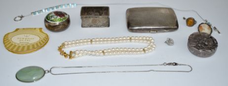 A silver cigarette case, silver napkin ring, silver and enamel pot, silver ring, cameo brooch,