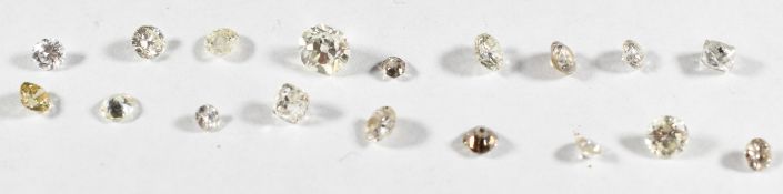 A collection of loose diamonds including an old cut diamond approximately 0.5ct, 0.63g