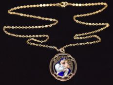 A 9ct gold pendant set with enamel depicting Mary and Jesus, verso enamel reading 'Svata Maria Matko