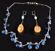 A silver necklace set with briolette cut sapphires and oval cut amethysts and a pair of silver