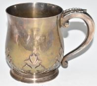 George V hallmarked silver pint tankard of baluster form, with card cut decoration, Birmingham 1939,