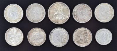 Ten pre WW2 German coins including 5 reichsmark 1934-1936 and a 1934 2Rm, together with a 1901 and a