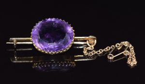 Edwardian gold brooch set with a mixed oval cut amethyst , 6g, 3.5cm