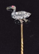 Victorian stick pin in the form of a duck set with rose cut diamonds and ruby eye, 6.5cm