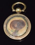 Late Victorian locket set with hair, verso engine turned decoration, 2cm