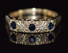 A 9ct gold ring set with sapphires and diamonds, 2.4g, size L