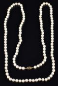 A single strand of cultured pearls with 9ct gold clasp, 88cm long, 46.9g