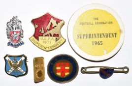Seven football and sports related badges including enamel UEFA 1971 Superintendent, The Football
