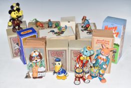 Twelve Japanese clockwork and similar tinplate toys including Elephant Drummer, Disney Mickey