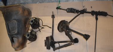 Triumph Herald car twin SU carburettors, suspension parts, steering rack and tunnel