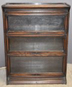 Globe Wernicke style three section oak bookcase with up and over doors W87 x D 33 x H 113cm