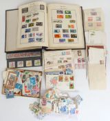 The Meteor stamp album containing a collection of GB and world stamps along with various loose