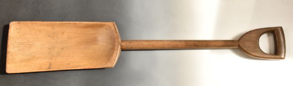English country style carved wood malt shovel, length 105cm