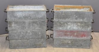 Eight heavy duty industrial stacking galvanised trays, L57 x D30 x H14cm