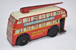 Brimtoy tinplate friction powered trolley bus with 'Buy British Transport Bus Made in England