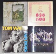 Approximately 100 albums including The Beatles, Bob Dylan, The Who, Dire Straits, ELP, Joe Cocker,