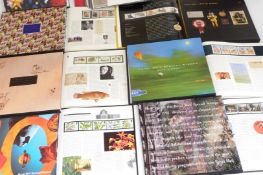 Eleven Royal Mail yearbooks 1985-1995 with contents, together with a 'New Thames cover album'