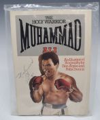 Muhammad Ali signed illustrated biography 'The Holy Warrior Muhammad Ali', signed and dated Dec 18