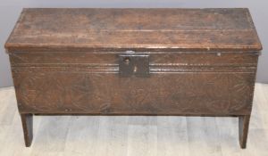 17thC carved elm coffer raised on V plank ends, W92 x D34 x H48cm