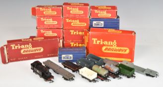 Twenty-four Tri-ang and Hornby Dublo 00 gauge model railway locomotives, wagons, tankers, rolling