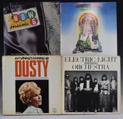 A collection of albums including Status Quo, ELO, Michael Jackson etc