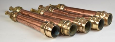 Five vintage brass and copper fire hose nozzles, four marked Merryweather